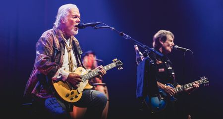 Randy Bachman and Burton Cummings perform onstage