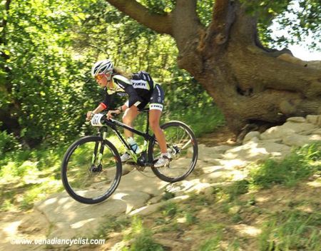 Emily Batty (Subaru-Trek) on one of the rocky descents of the 2012 Olympic mountain bike course.