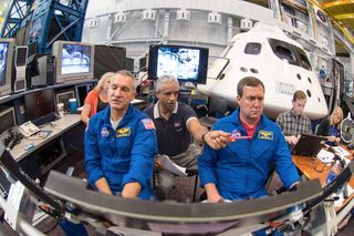 Astronauts Training for Orion Capsule Simulator