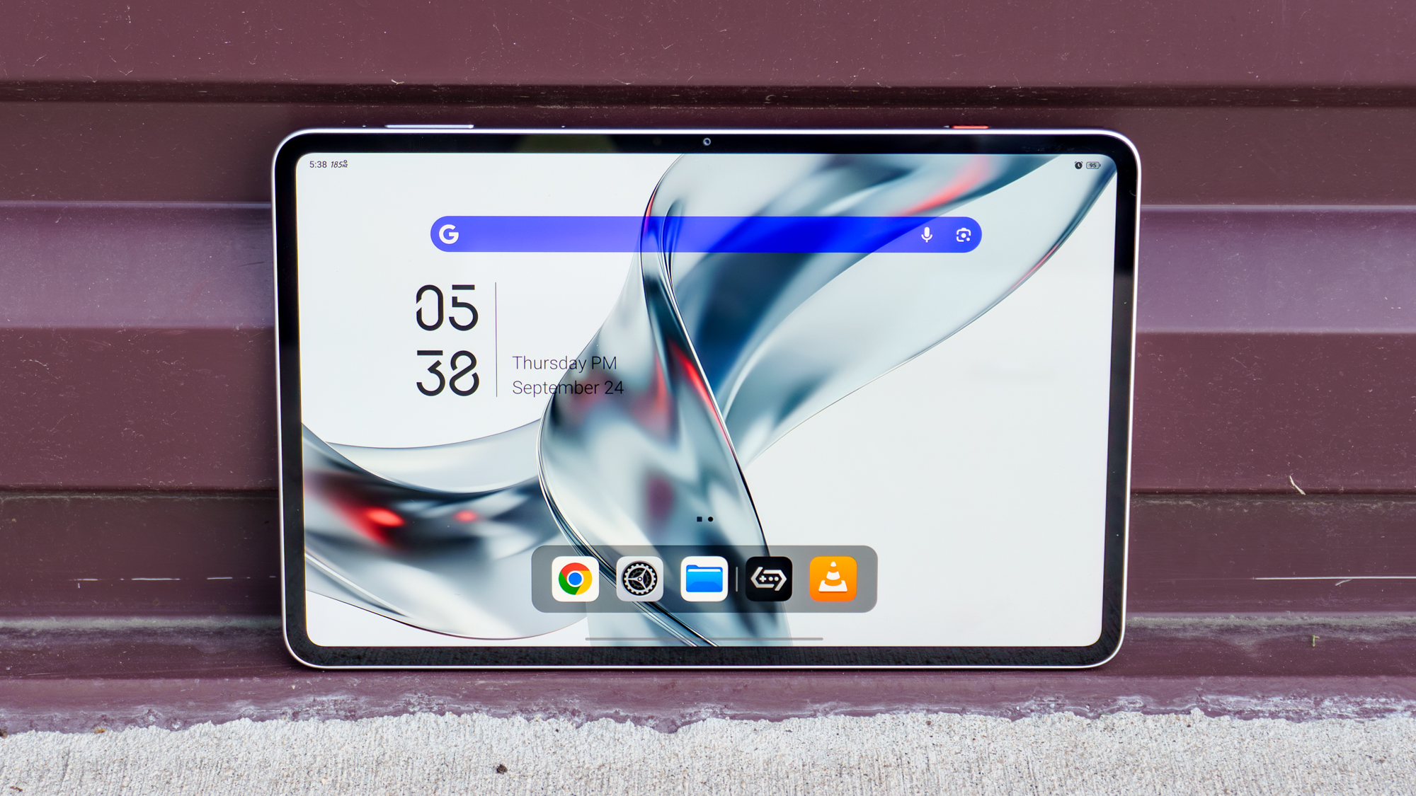 The RedMagic Astra 2 gaming tablet in landscape mode up against a wall