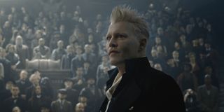 Fantastic Beasts and the Crimes of Grindelwald Johnny Depp stands in front of his audience