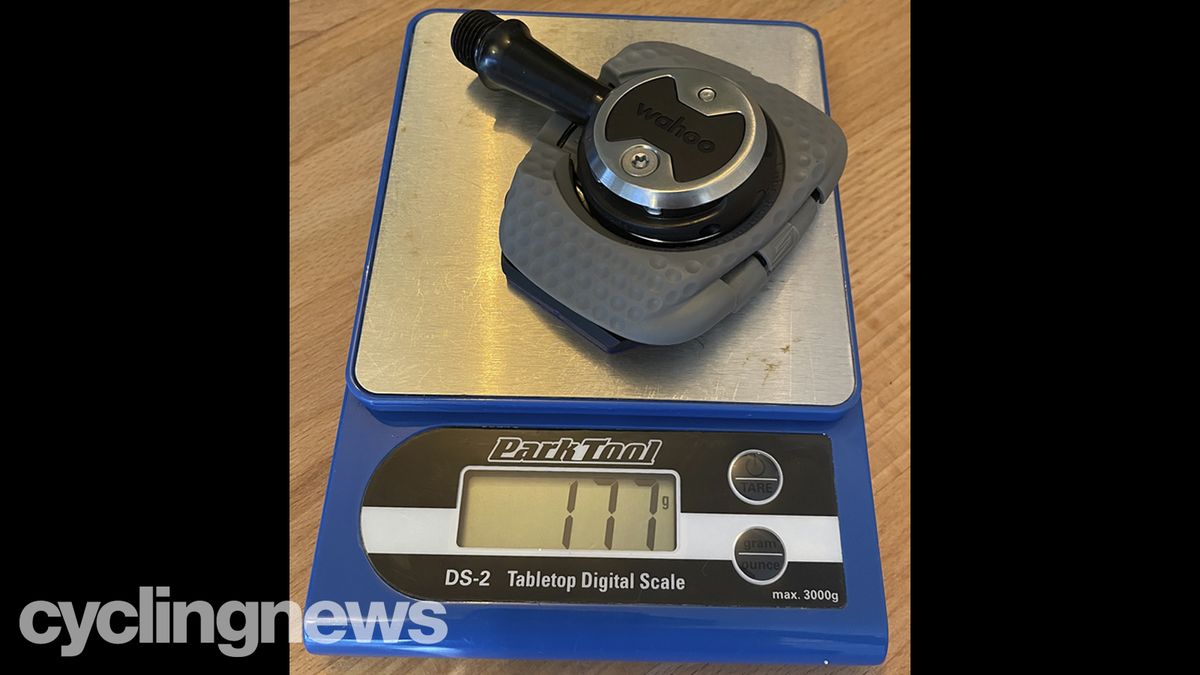 A Wahoo Speedplay Comp pedal and cleat on a Park Tool scale showing a weight of 177g