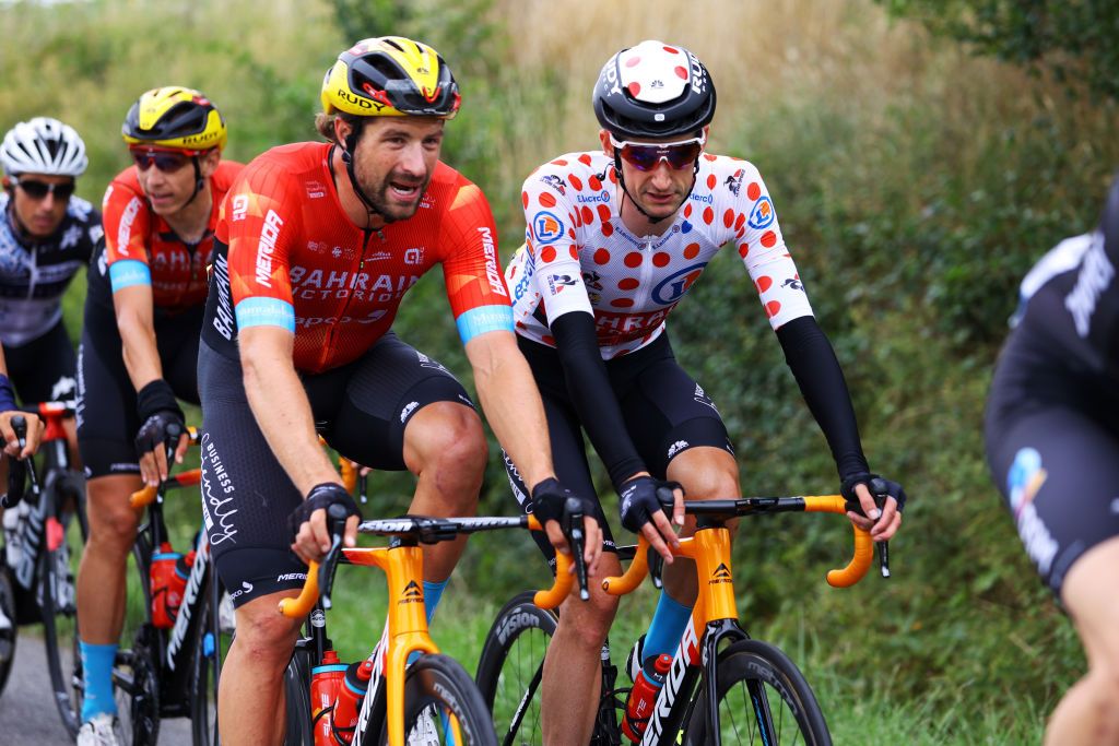 SAINTLARYSOULAN COL DU PORTET FRANCE JULY 14 Marco Haller of Austria Wout Poels of The Netherlands and Team Bahrain Victorious Polka Dot Mountain Jersey during the 108th Tour de France 2021 Stage 17 a 1784km stage from Muret to SaintLarySoulan Col du Portet 2215m LeTour TDF2021 on July 14 2021 in SaintLarySoulan Col du Portet France Photo by Tim de WaeleGetty Images