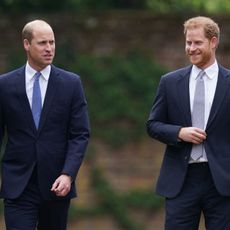 Britain's Prince William, Duke of Cambridge (L) and Britain's Prince Harry, Duke of Sussex arrive for the unveiling of a statue of their mother, Princess Diana at The Sunken Garden in Kensington Palace