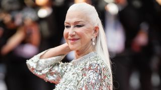 Helen Mirren is pictured with waist-length, platinum blonde hair as she attends the screening of "Mother And Son (Un Petit Frere)" during the 75th annual Cannes film festival at Palais des Festivals on May 27, 2022 in Cannes, France.