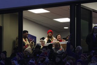 Taylor Swift attending chiefs games in chiefs color outfits