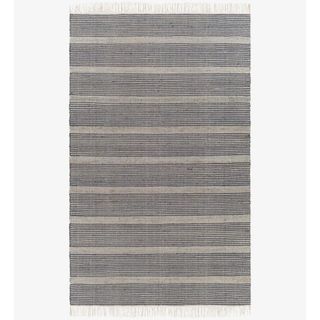 Blue and cream striped rug with tassels