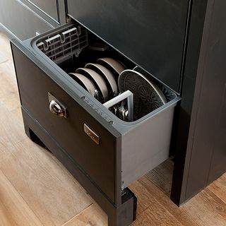 grey coloured dishwasher with wooden flooring