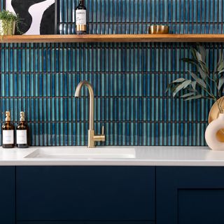 Teal blue kitchen splashback with kitkat tiles