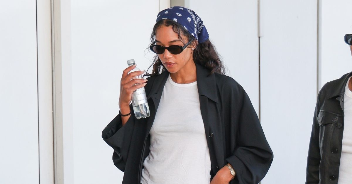 Laura Harrier’s Anti-Leggings Trousers Make Airport Dressing Chic