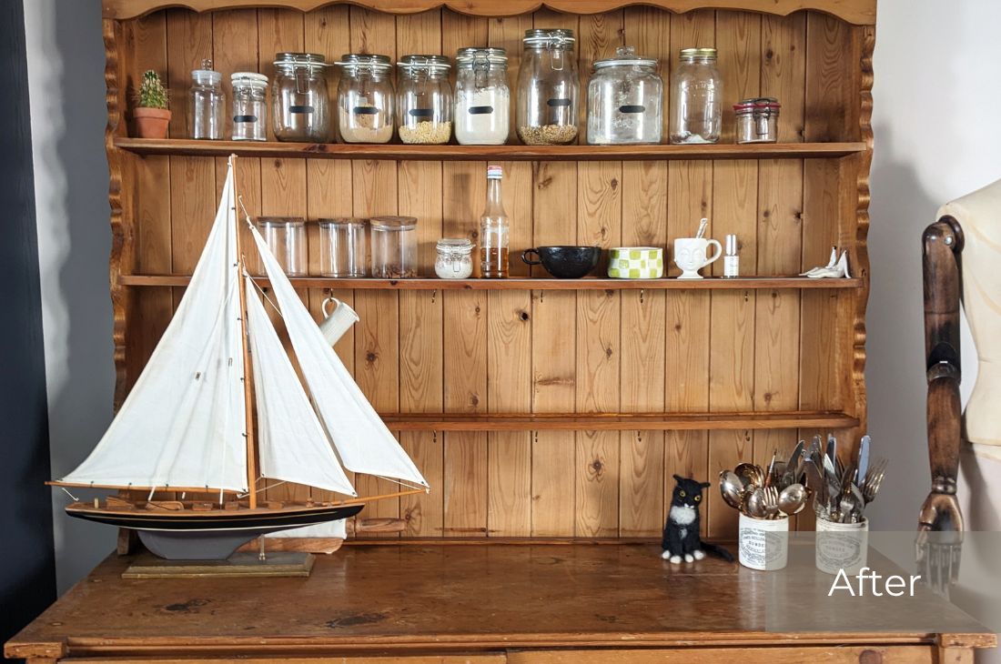 After photo shows much less items on shelves, no spare items on surface of dresser and a model sail boat neatly to the side following using the 5x5 Cleaning Method