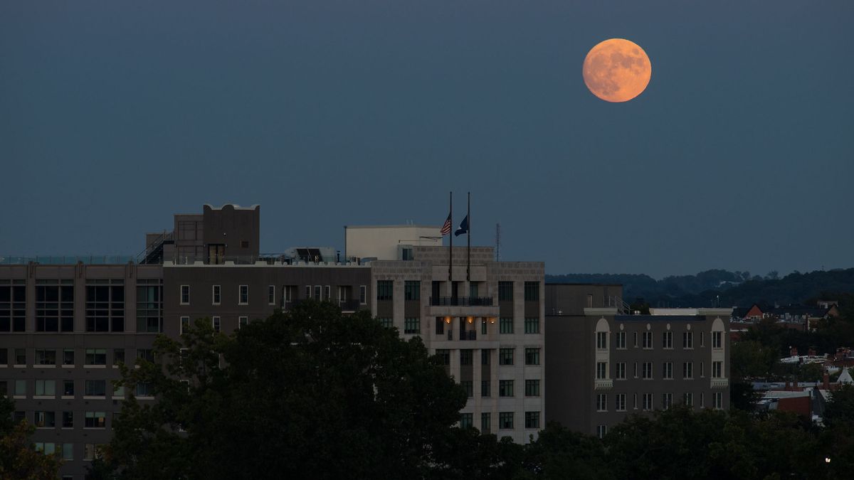 The nearly full moon is seen as it rises from The Observatory at America&rsquo;s Square in Washington, Tuesday, Oct. 19, 2021.