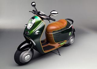 Green bodywork of the single-seater scooter.