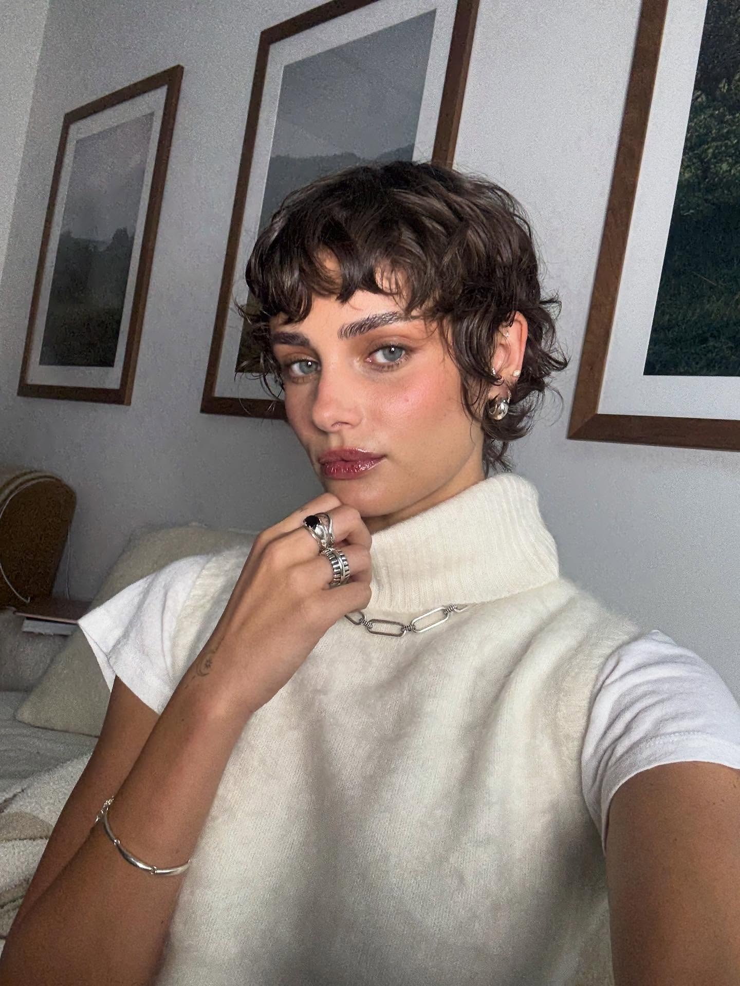 A selfie of model Taylor Hill with a modern mullet haircut.