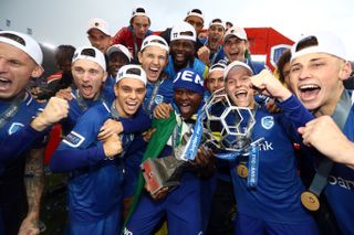 Genk players celebrate their Belgian championship win in May 2019.