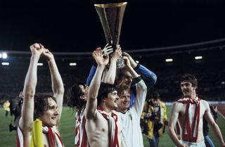 Borussia Monchengladbach players celebrate with the trophy after winning the UEFA Cup final against Red Star Belgrade in May 1979.