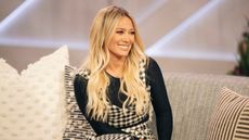 Hilary Duff on neutral couch