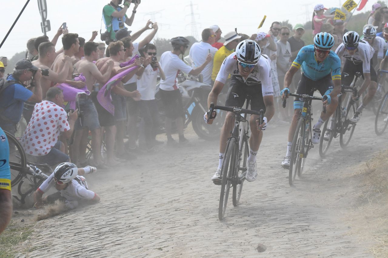 Michal Kwiatkowski (Team Sky - right) got a cobbled turn wrong
