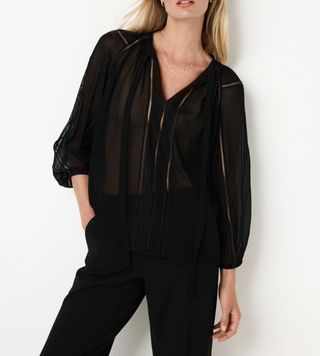 Image of black sheer blouse