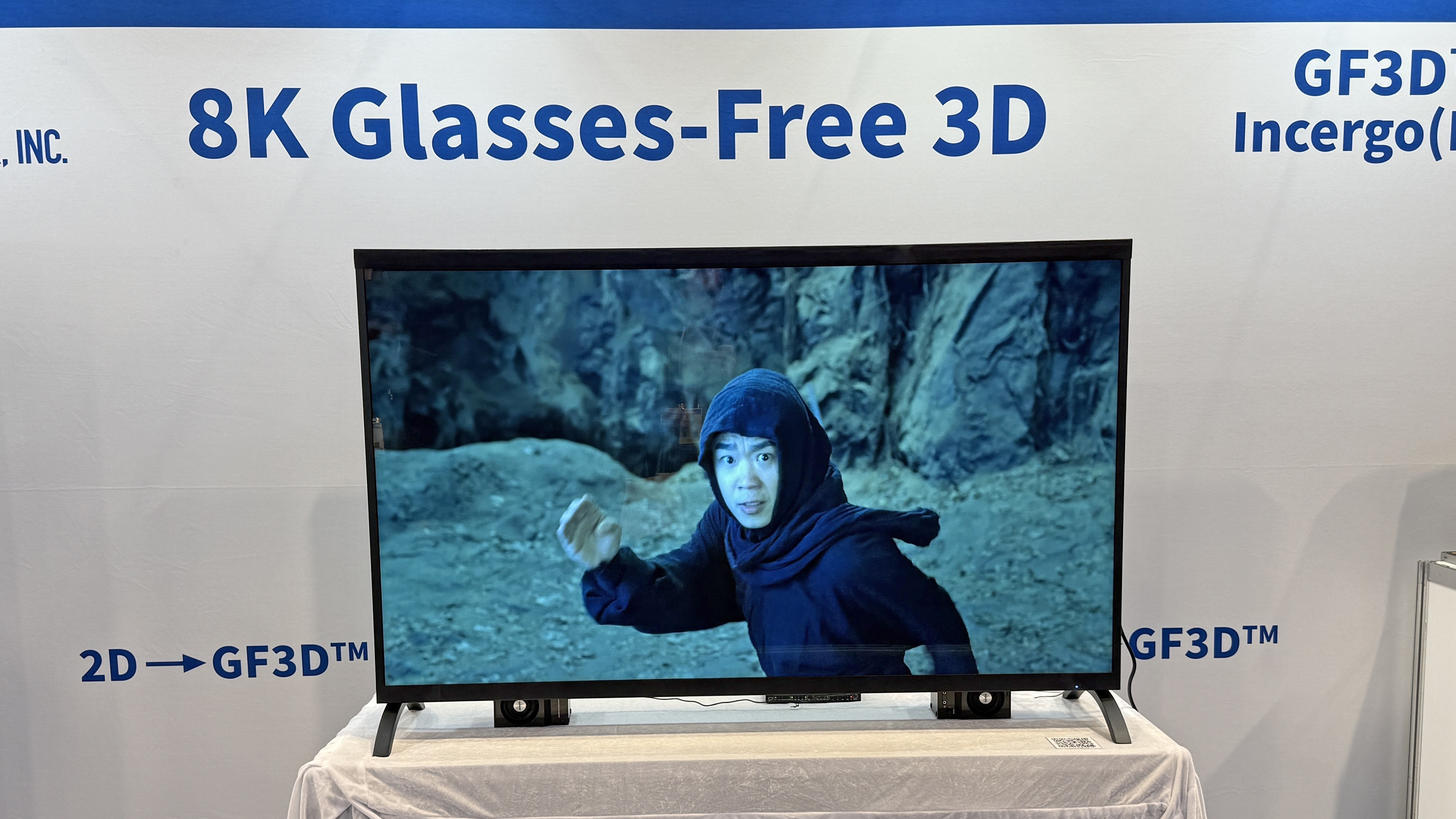 Visual Semiconductor's GF3D TV at CES 2026, showing a man standing in front of a rock wall, preparing to fight something offscreen