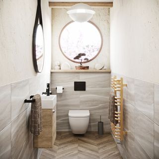 Neutral small bathroom with large scale tiles and floating furniture