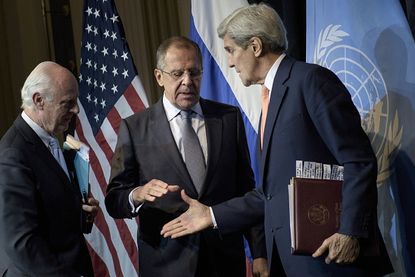 John Kerry, Staffan de Mistura, and Sergei Lavrov at a press conference.