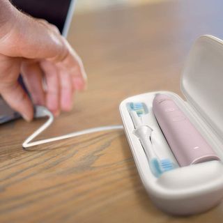 Philips Sonicare DiamondClean review: pink electric toothbrush inside travel pouch