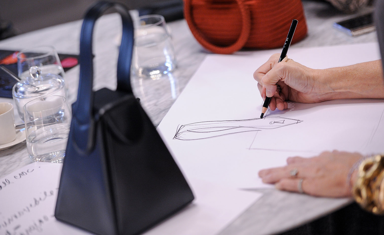 A navy blue handbag