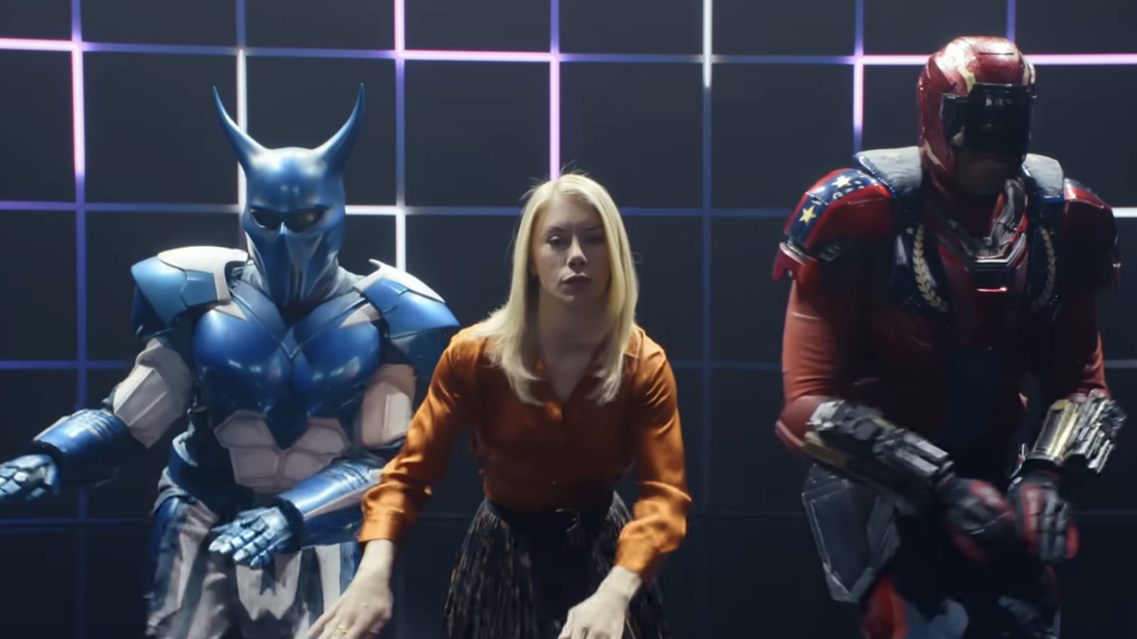Harcourt dancing with Blue Dragon and Keith Smith in Peacemaker Season 2