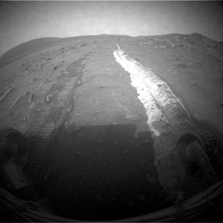 With Spirit dragging its damaged right front wheel through the Martian dirt, it unearthed bright patches that turned out to be almost pure silica.