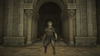 Elden Ring character wearing gold and black armor standing in front of a stone archway.