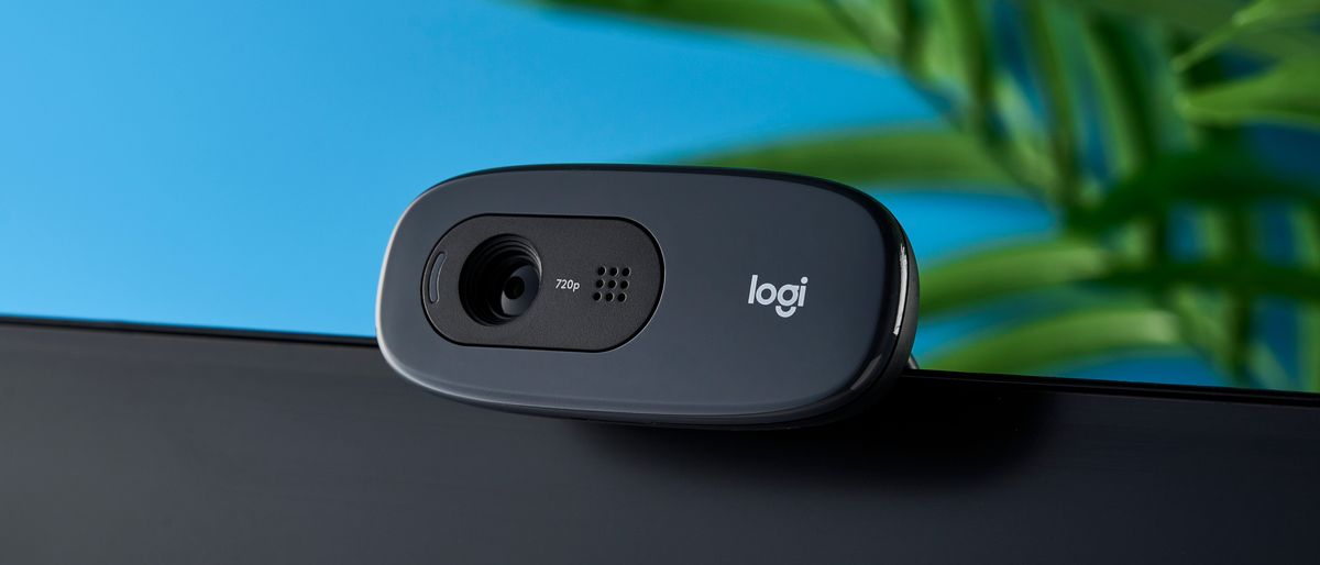 the front of a small, black, oblong-shaped webcam with a universal attachment clip and a logi logo 