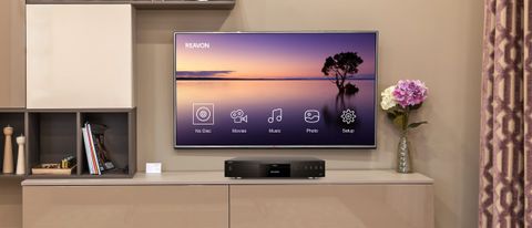 The Reavon UBR-X200 on a home entertainment center.