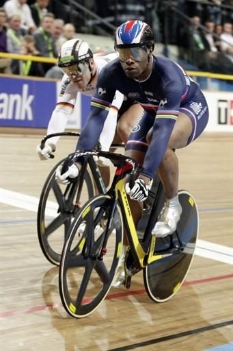 Gregory Bauge from France and Robert Forstemann from Germany ride during the quarter finals of the men's sprint