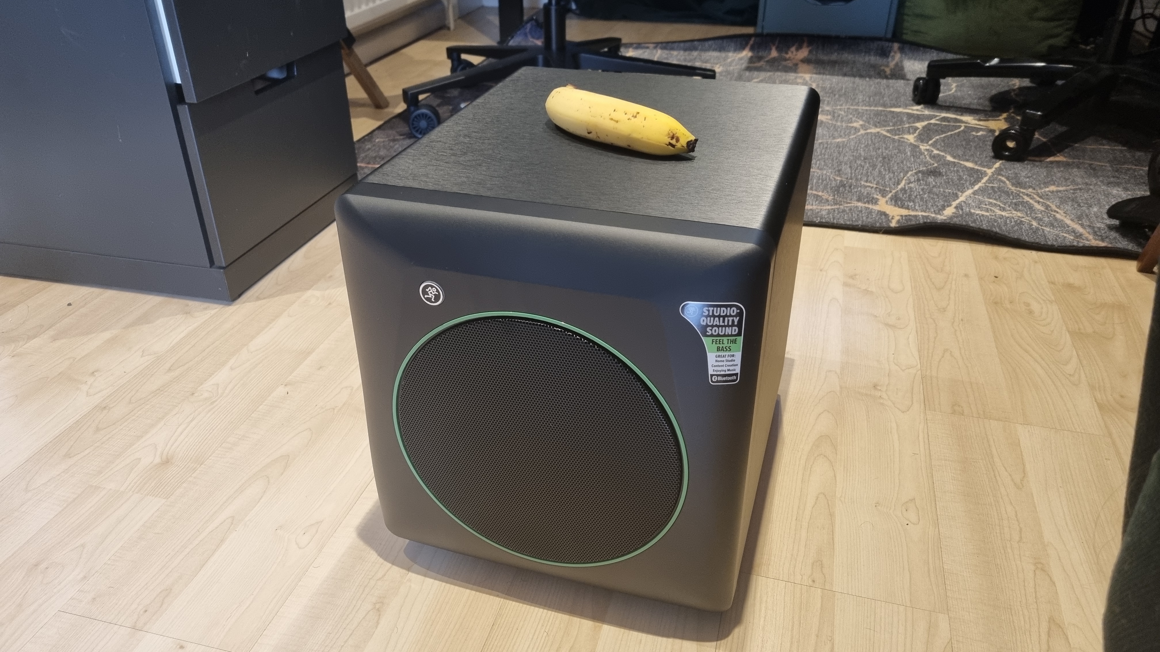 The Mackie CR8SBT subwoofer, with a banana for scale