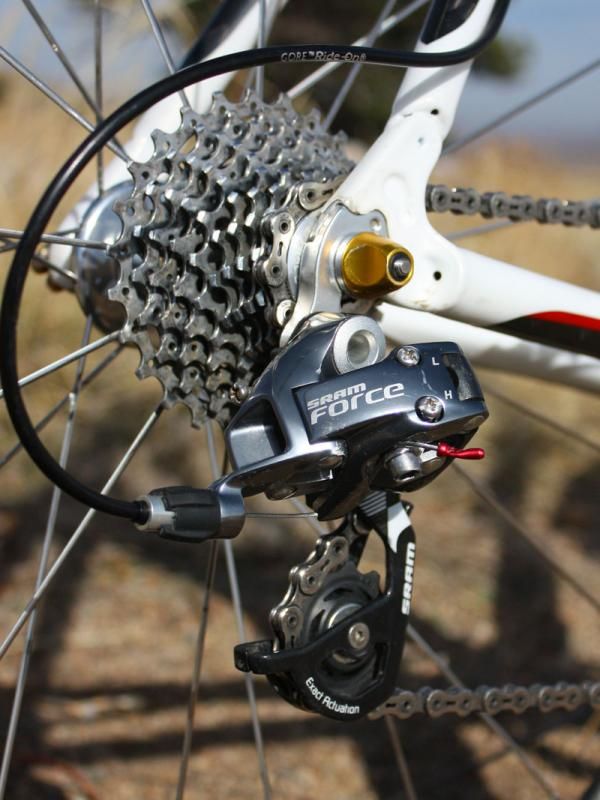 A SRAM Force rear derailleur handles gear changes across the cassette.