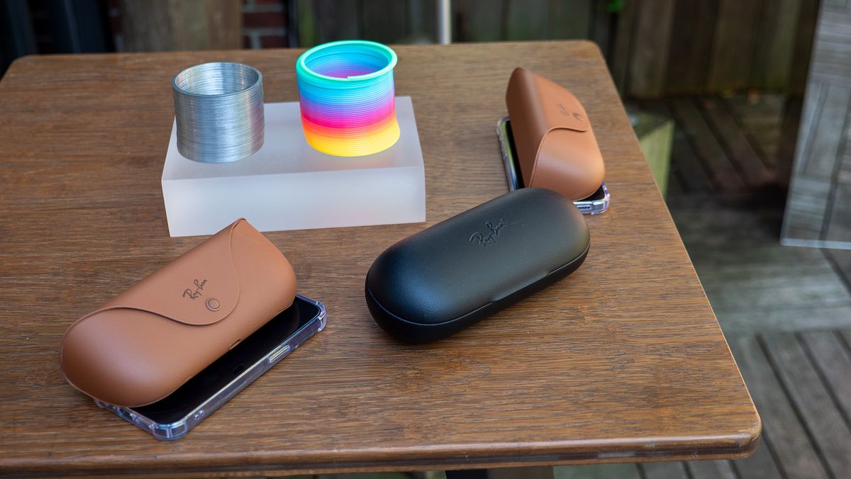 Comparing Ray-Ban Meta smart glasses in the new tan charging case with Ray-Ban Stories in its larger black charging case