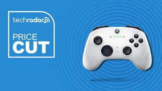 A white and black Xbox controller against a blue background