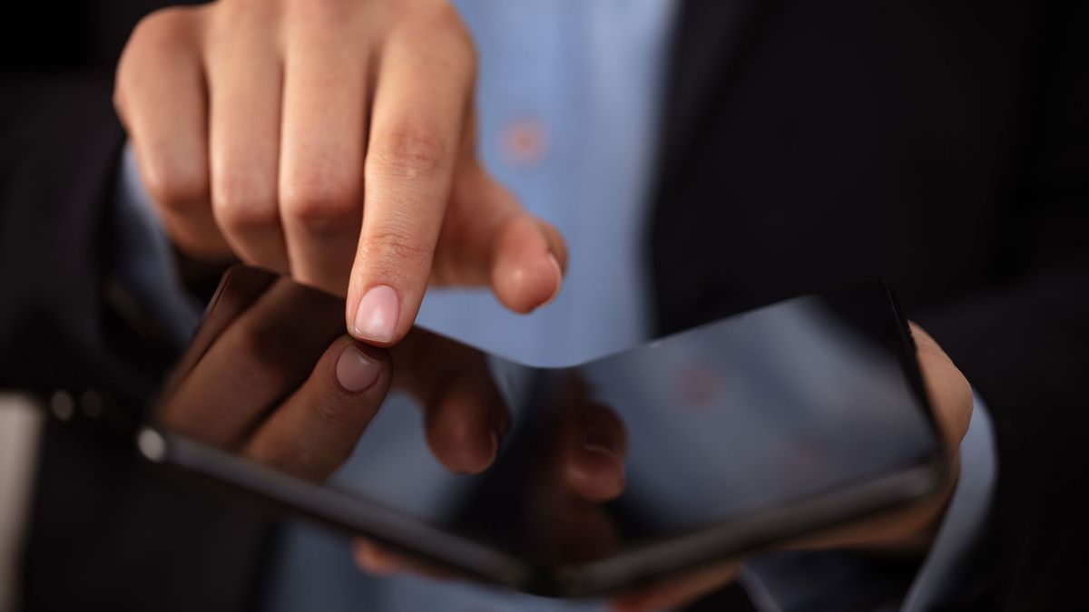 man holding a foldable smartphone