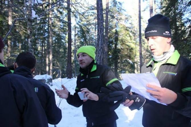 Elia Viviani points the way during orienteering.