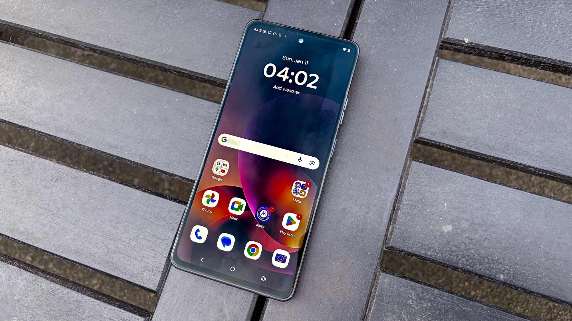 Moto G Power 2026 in hand showing home screen