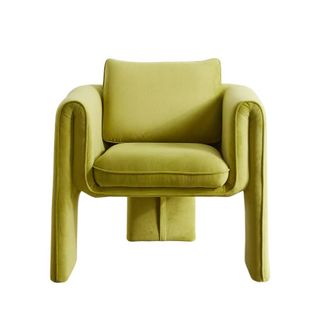 A lime green velvet armchair