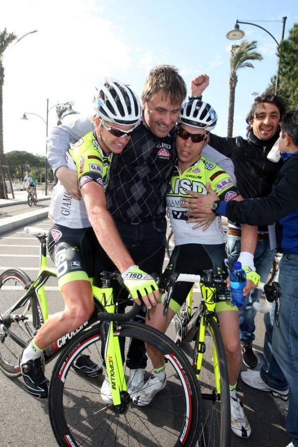 ISD-Neri's Simon Clarke and Giovanni Visconti with some very happy team staff