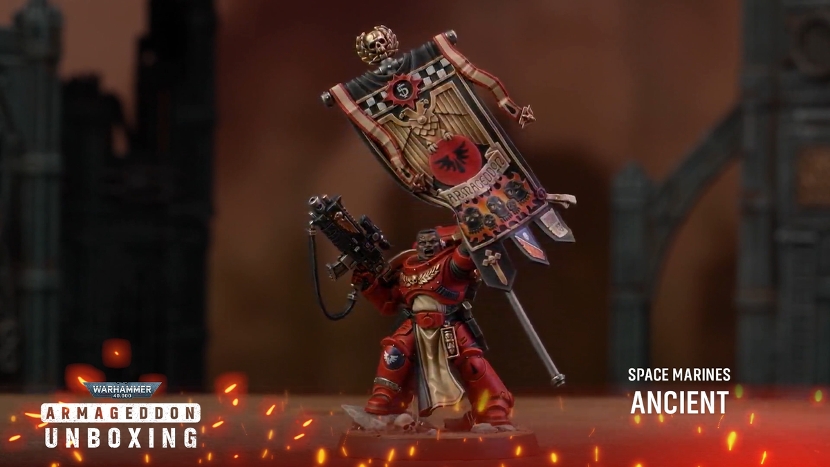 Warhammer 40K Space Marine models on a rocky battlefield