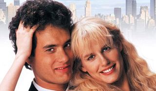Splash Tom Hanks and Daryl Hannah getting close in front of a city backdrop