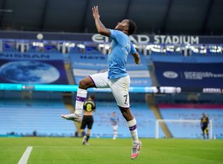 Raheem Sterling celebrates after scoring for Manchester City against Arsenal in June 2020, the first goal after a long break due to the Covid-19 pandemic.