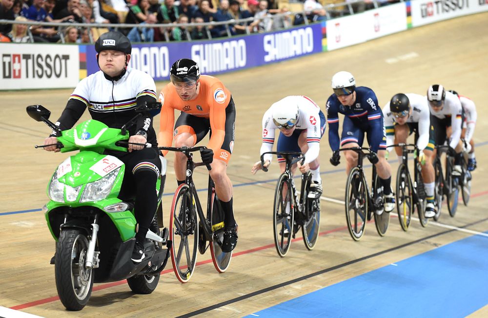 Netherland's Matthijs Buchli (2nd L) competes in the men's Keirin competition during UCI Track Cycling World Championships