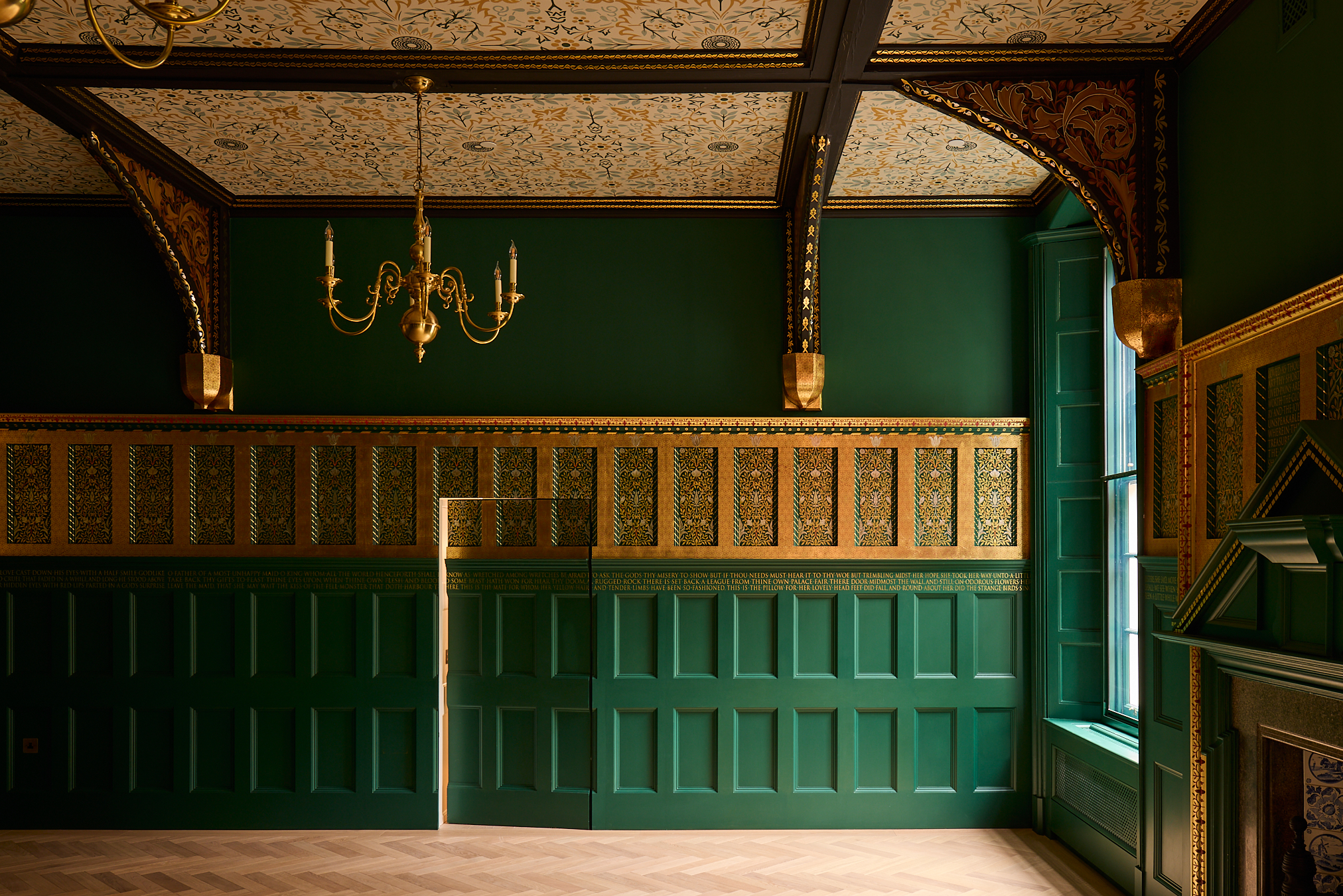 The restored dining room at One Palace Green, painted in a sensational shade of green and gold.