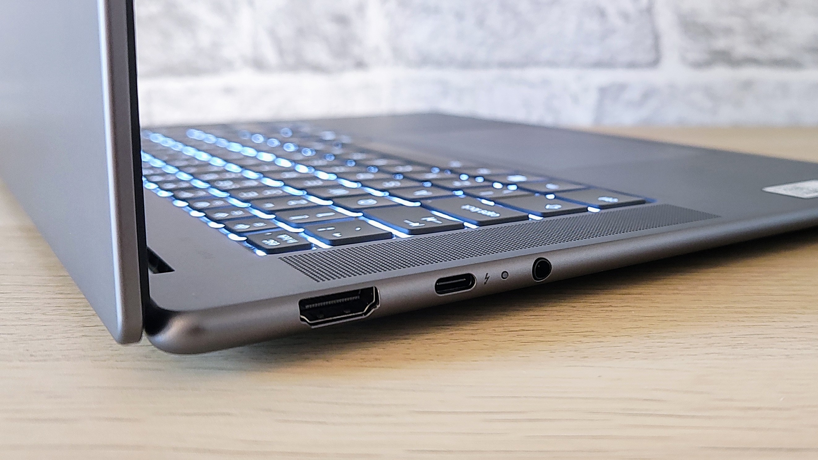 The Lenovo Yoga Slim i7 Gen 9 Aura Edition on a desk