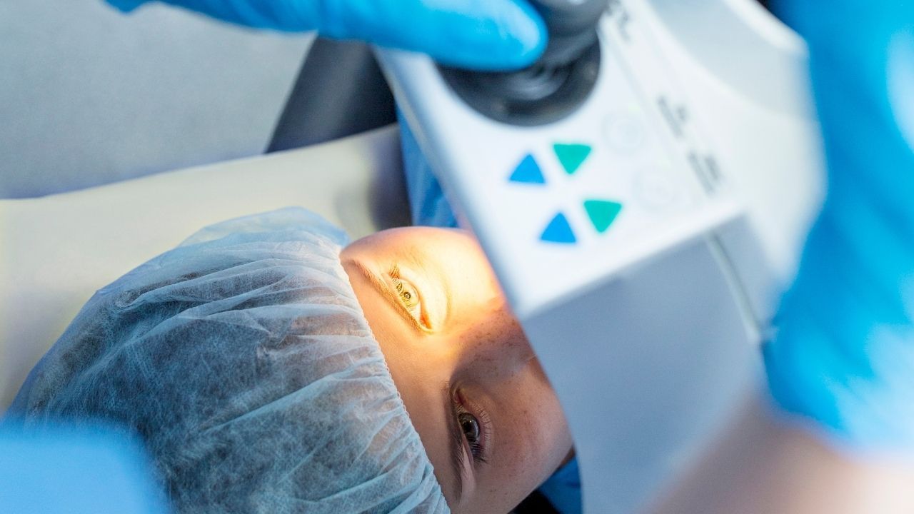 woman undergoing laser eye surgery